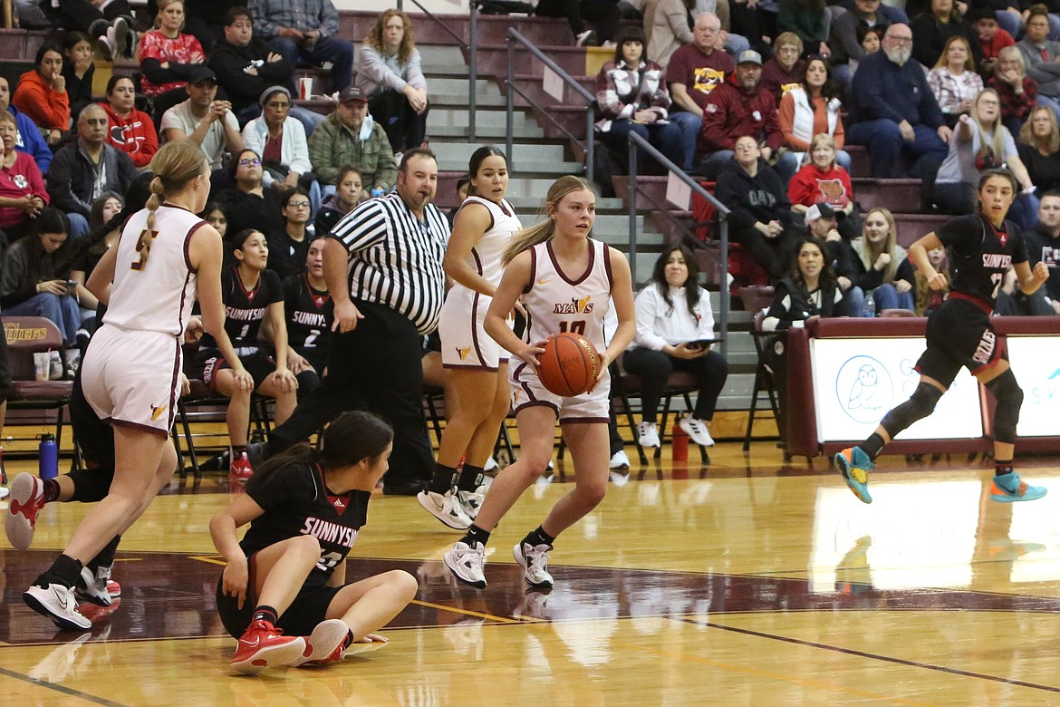 Moses Lake junior Kendall Reffett grabs a rebound against Sunnyside on Jan. 27. The Mavericks moved on to face the Grizzlies on Saturday with a berth to state on the line.