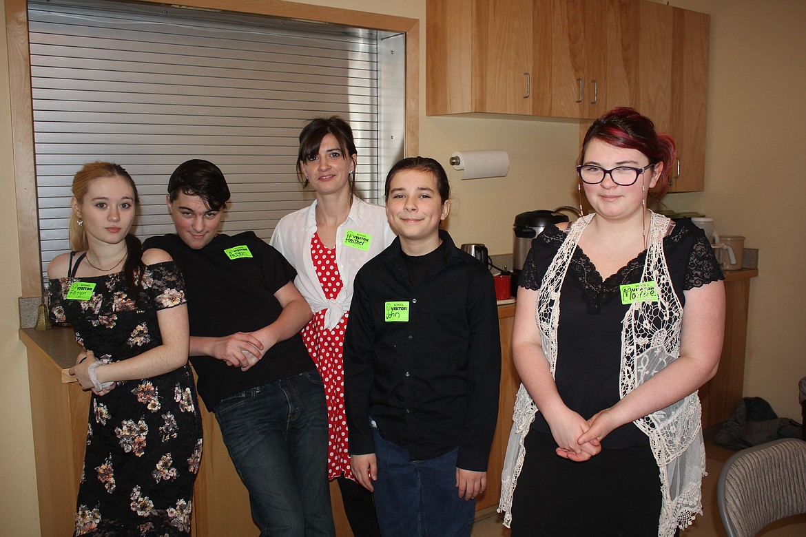 Heather Hotchkiss with her children and a nephew helped serve the meals to around 80 people Valentines Day at the St. Regis Senior Citizens Center. (Monte Turner/Mineral Independent)