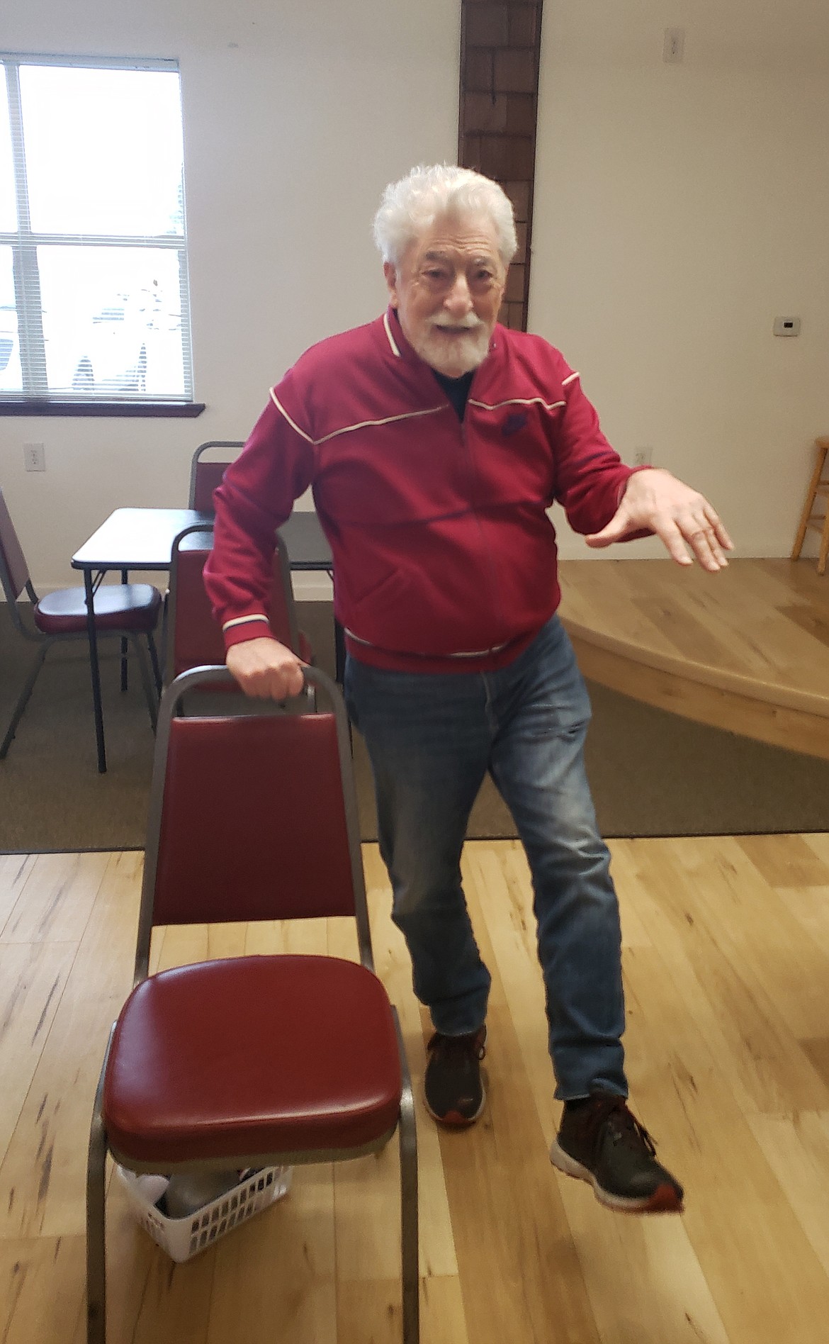 Marco DiBiase flexes his wrists and ankles up and down at a Fit 'n' Fall Proof class Monday at the Hayden Senior Center. Fit 'n' Fall classes across Kootenai County keep seniors active and resistant to falls or injuries, and more energized.