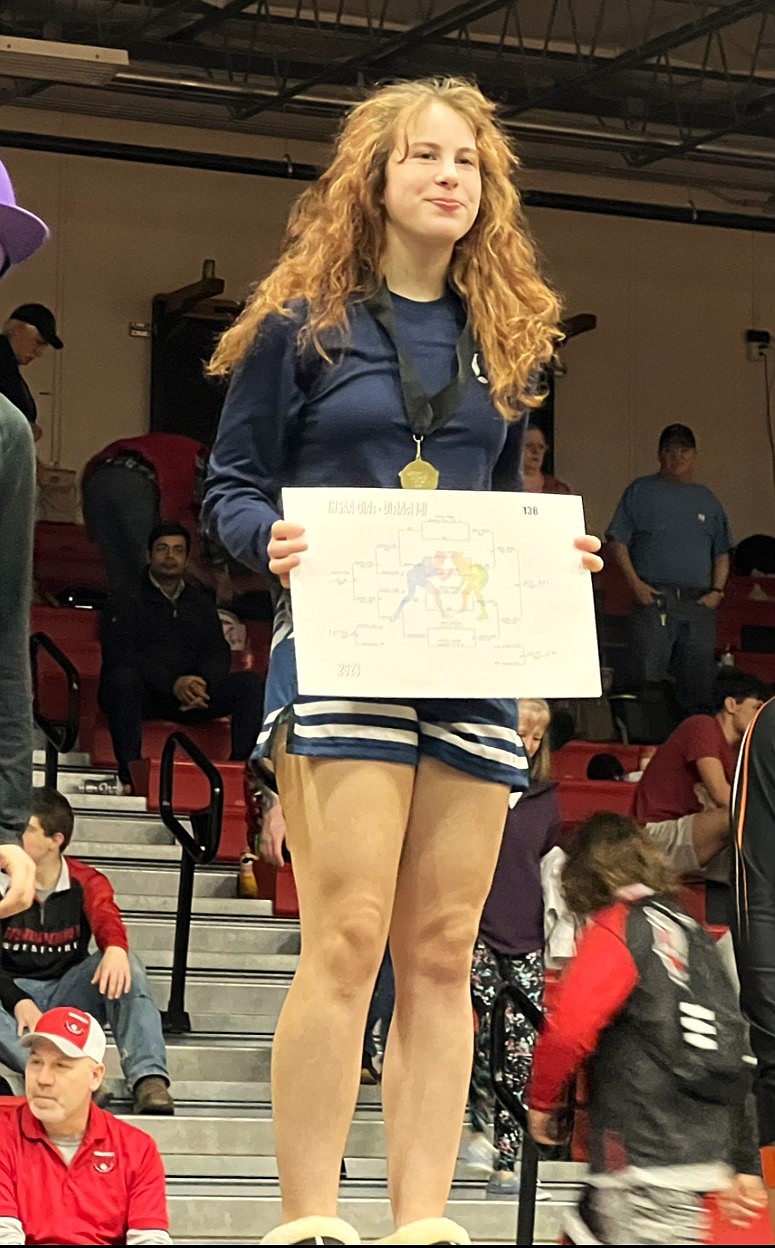 Aubrey Wells (138) is district champion at the Division I & II District Wrestling Championships.