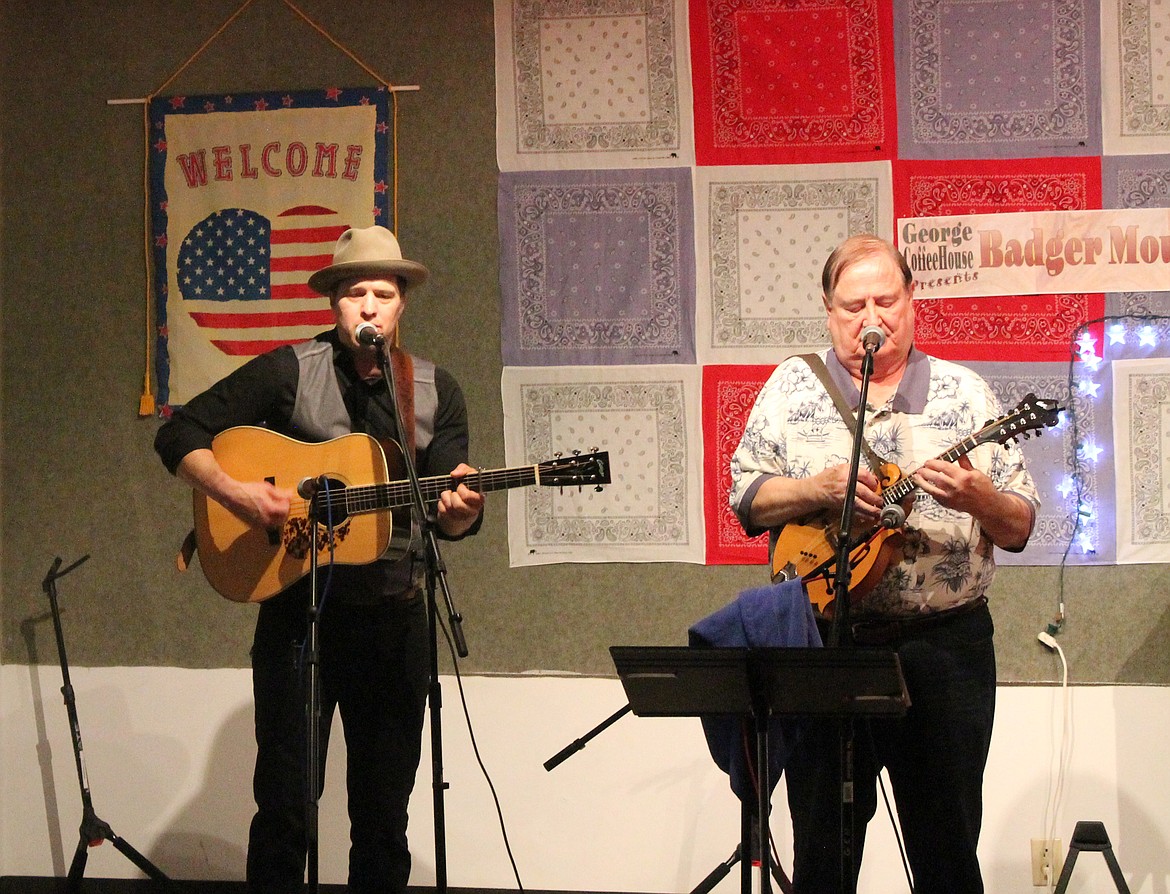 Grammy-winning guest guitarist Joe Smart, left, picks and sings on “Hallelujah, I’m Ready” while Jim Honeyman wrings high-speed notes from his mandolin.