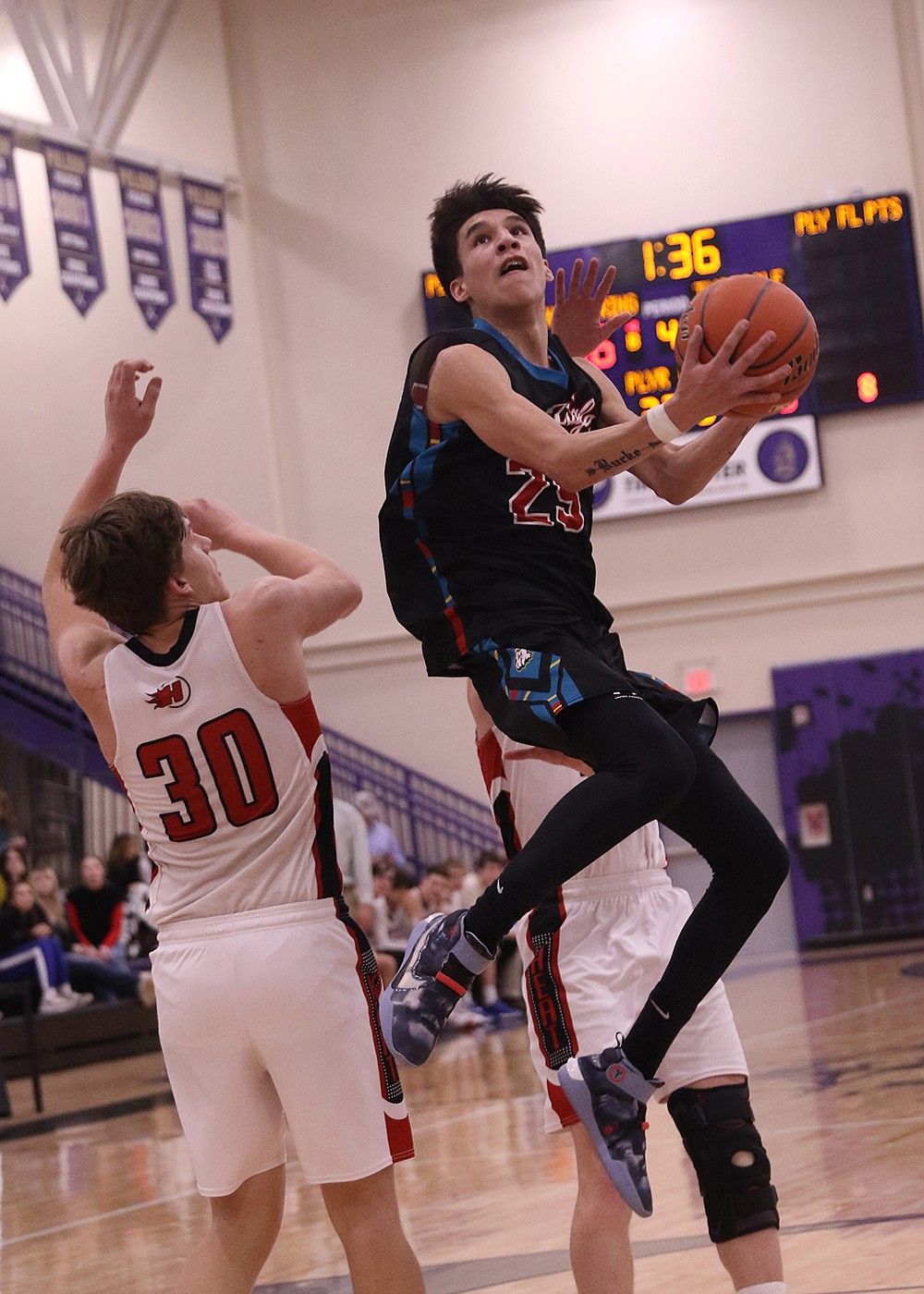 TERS Eagle Cai Burke goes up for a shot against Hot Springs Savage Heat during last weekend's Western 14C District Tournament in Polson. (Bob Gunderson photo)