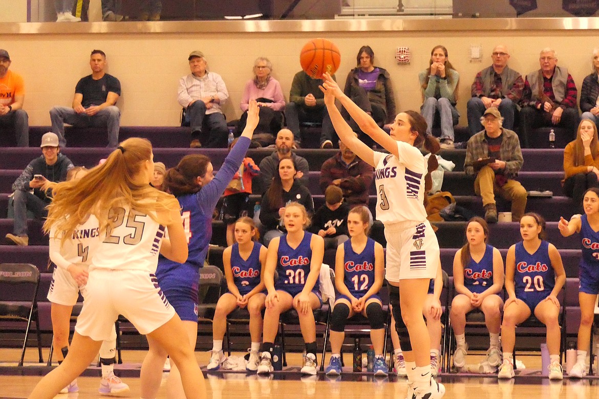 Charlo's Hayleigh Smith (3) shoots over Superior's Molly Patko (14) during the Lady Bobcats win over Charlo in the 14C championship game Saturday in Polson. (Chuck Bandel/MI-VP)