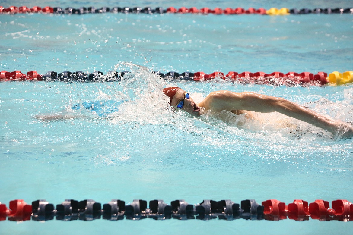 Moses Lake senior Ashton McKean swims during the final lap of the 400-yard freestyle relay on Friday’s preliminary round of the 2023 Boys State Swim and Dive Championships.