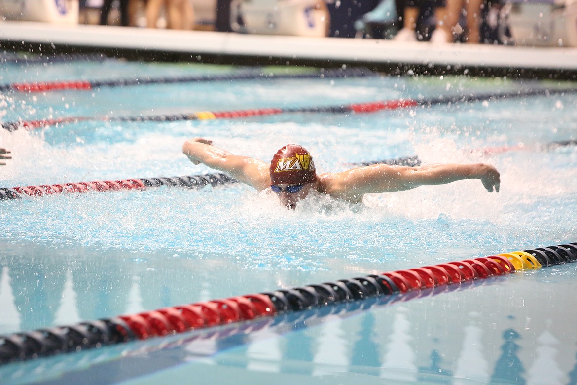 Moses Lake sophomore Luke Molitor competes in Saturday’s 100-yard butterfly finals at the 2023 Boys State Swim and Dive Championships.