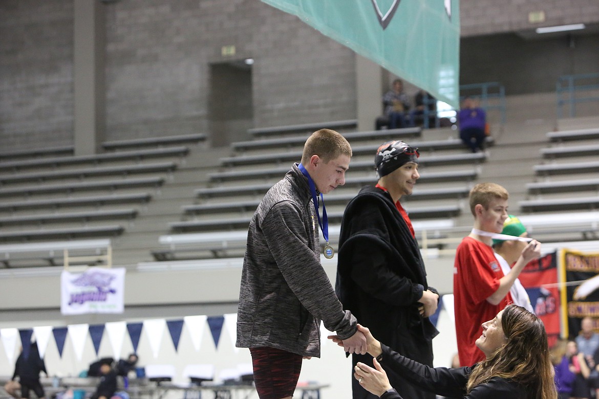 Moses Lake junior Danny Thurman finished first in both the adaptive 50-yard freestyle and the 50-yard backstroke events, earning a medal for both swims.