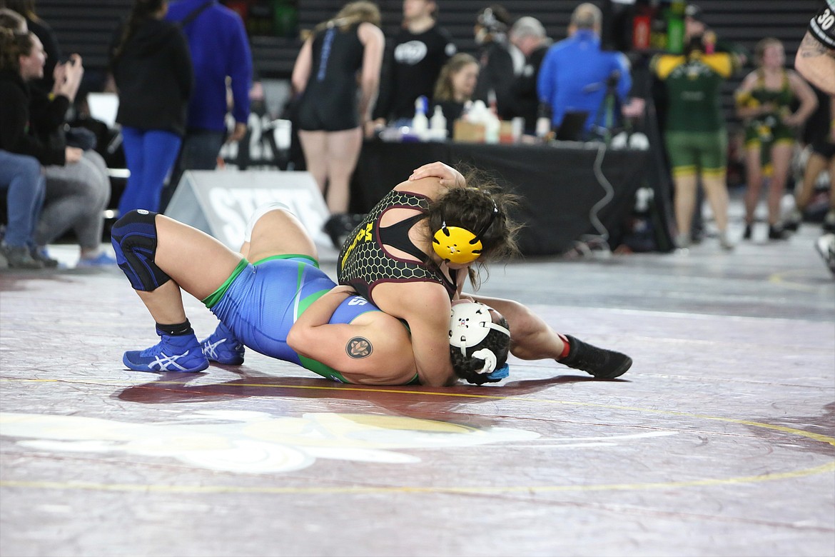 Moses Lake sophomore Katelyn Rodriguez, top, took fifth in the 170-pound bracket of the Girls 3A/4A Mat Classic.