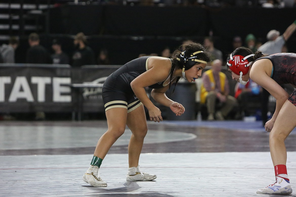 Royal freshman Sharon Arroyo, left, placed fifth at the 2A/1A/2B/1B Mat Classic at the Tacoma Doma. Head Coach Jesus Carlos Villa said wrestlers like Arroyo are setting the standard for incoming Knights.