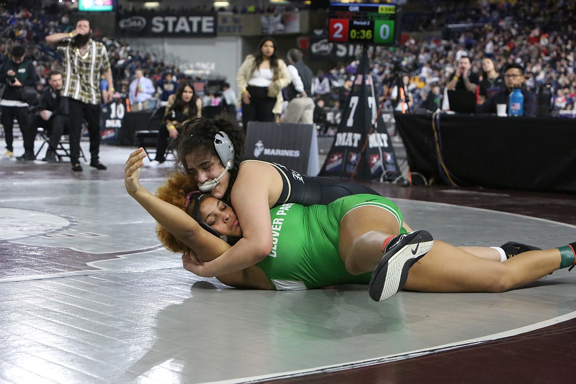 Royal junior Emma Villa, top, took third at the Mat Classic in Tacoma over the weekend. Villa is now a two-time state placer after taking second last year.