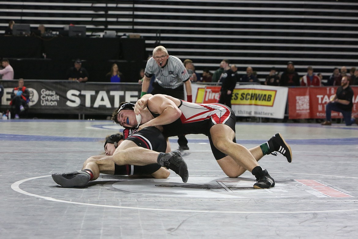 Lind-Ritzville/Sprague sophomore Brock Tracy, top, took fifth place in the boys 2B/1B 195-pound bracket at the 2023 Mat Classic at the Tacoma Dome.