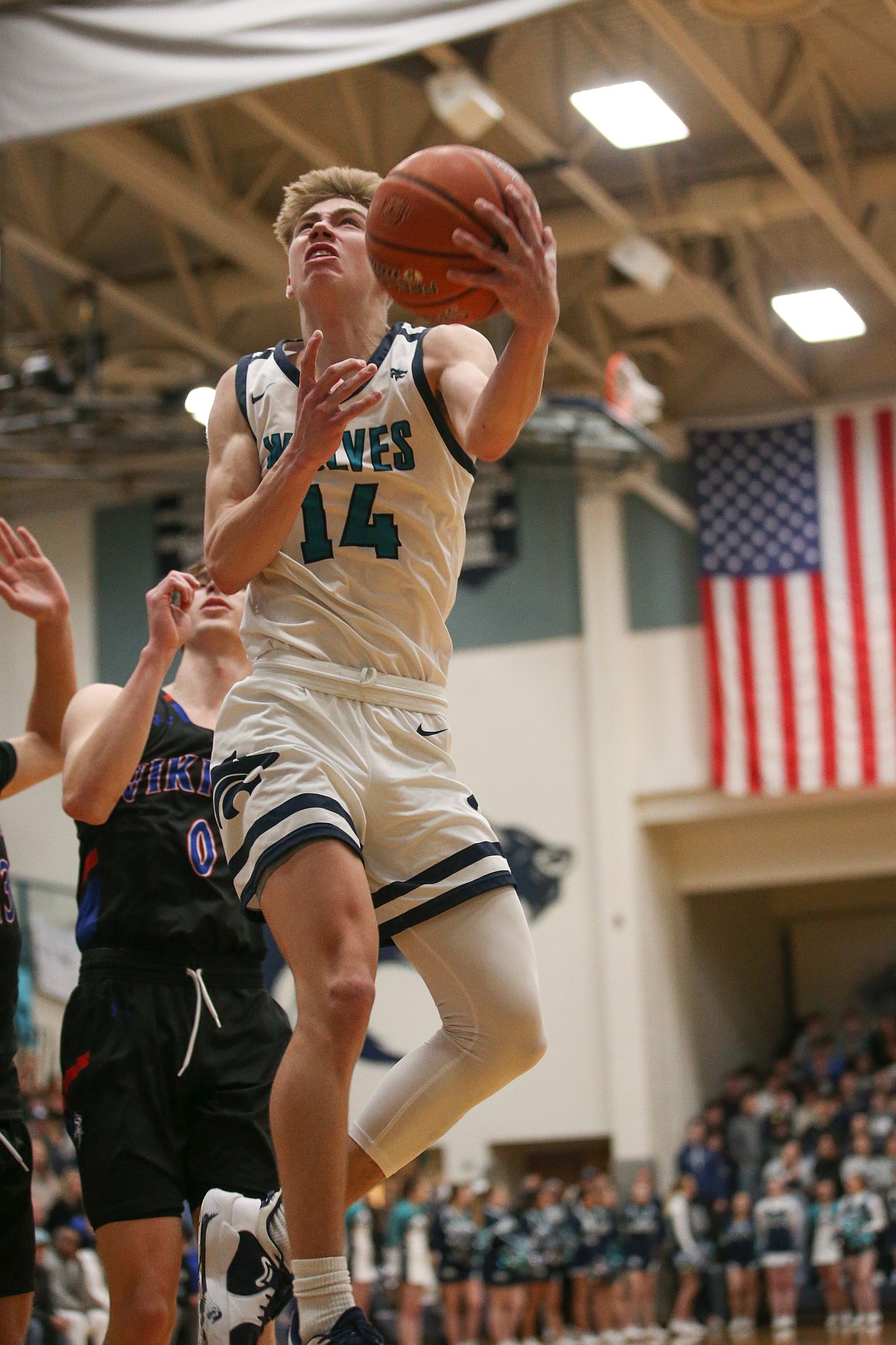 JASON DUCHOW PHOTOGRAPHY
Lake City senior point guard Kolton Mitchell drives for two of his game-high 26 points in Tuesday night's 5A Region 1 championship win over Coeur d'Alene.