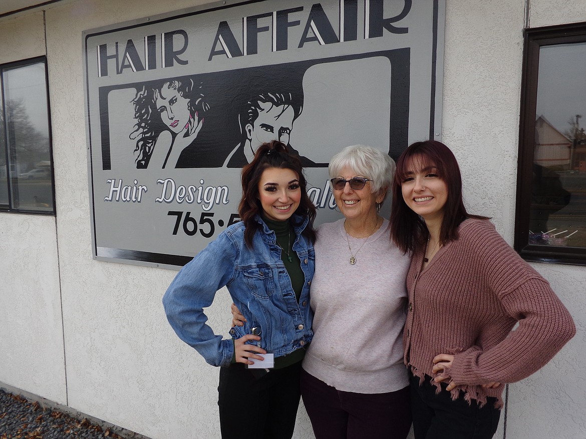 McKenzie Garza, Linda Benson and Abby Garza in front of their business at 424 S. Alder St. in Moses Lake.