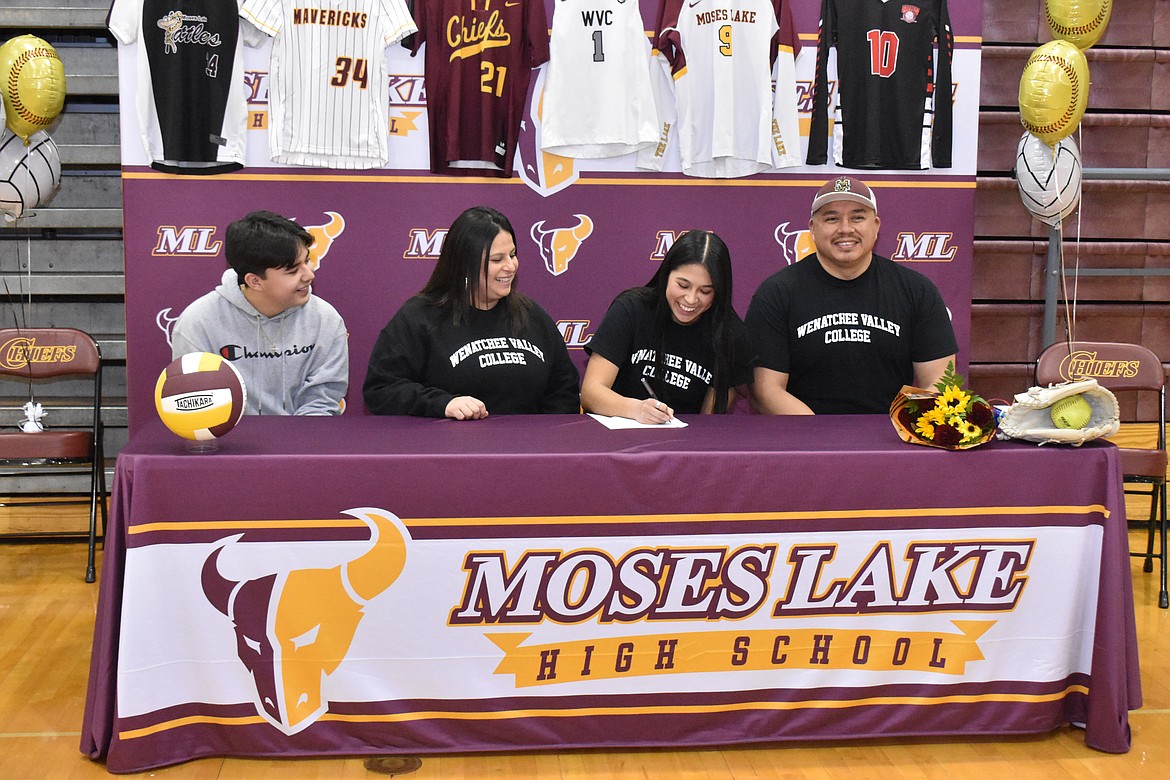 Moses Lake High School’s Jazlynn Torres was surrounded by her family Tuesday when she signed with Wenatchee Valley Community College. From left to right, Manuel Torres IV, Jessica Torres, Jazlynn Torres and Manuel Torres V.