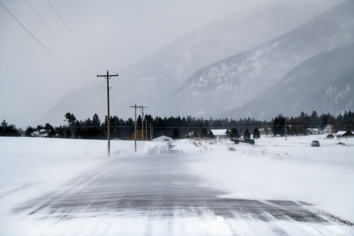 Snow and wind blow across Creston Hatchery Road on Tuesday, Feb. 21. (Casey Kreider/Daily Inter Lake)