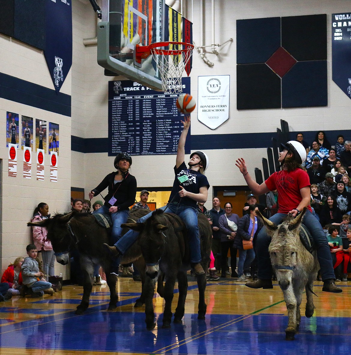 Basket attempt by Evelyn Chaney at Donkey Basketball.