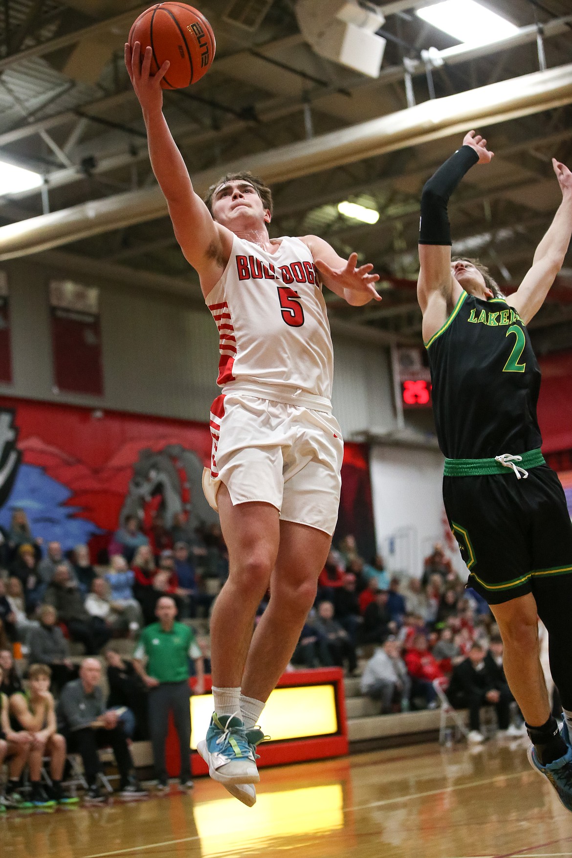JASON DUCHOW PHOTOGRAPHY
Sandpoint junior guard Max Frank goes up for a shot while Lakeland senior Nick Nowell defends during Game 1 of the 4A Region 1 best-of-3 championship series on Wednesday at Les Rogers Court.