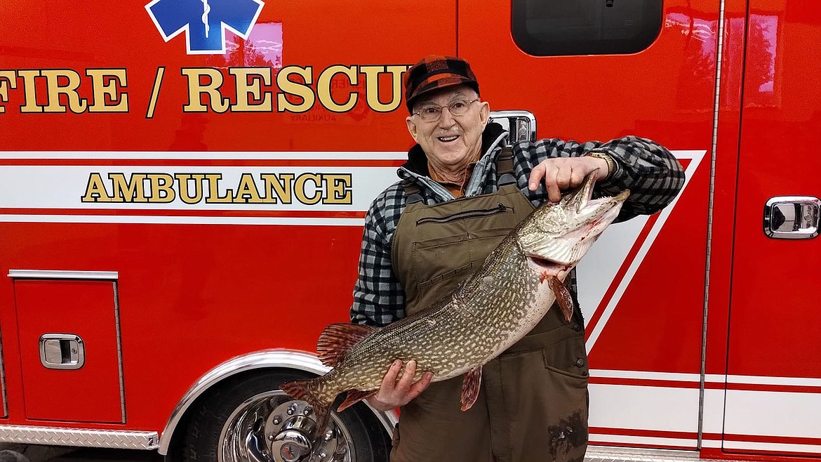 Darrel Dusek shows off his first-place northern pike that he caught during the Fisher River Valley Fire Rescue fishing derby last weekend. The fish weighed 14 pounds, 9 ounces. (Photo courtesy Fisher River Valley Fire Rescue)