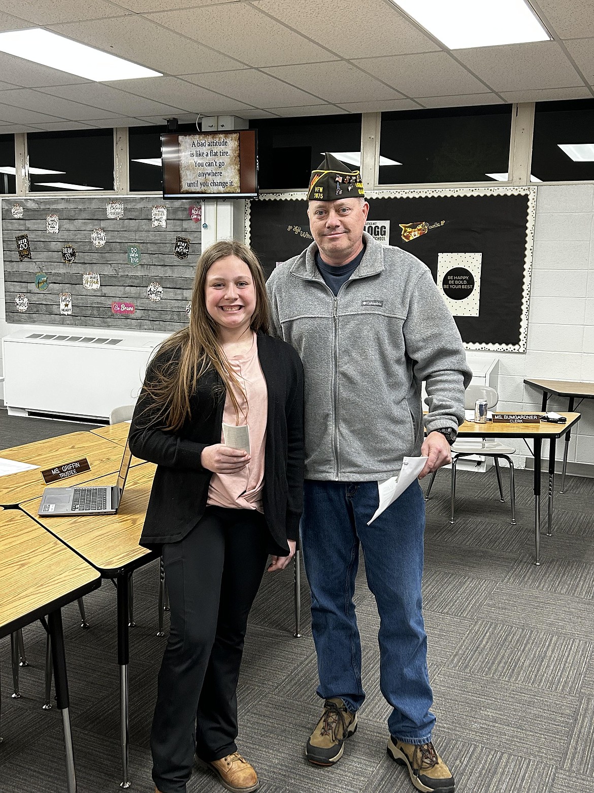 Kellogg Middle School student Alyssa Lopez stands with VFW Post 1675 Commander Chris Marker after Lopez was honored for her first-place essay winnings in the Patriot's Pen.