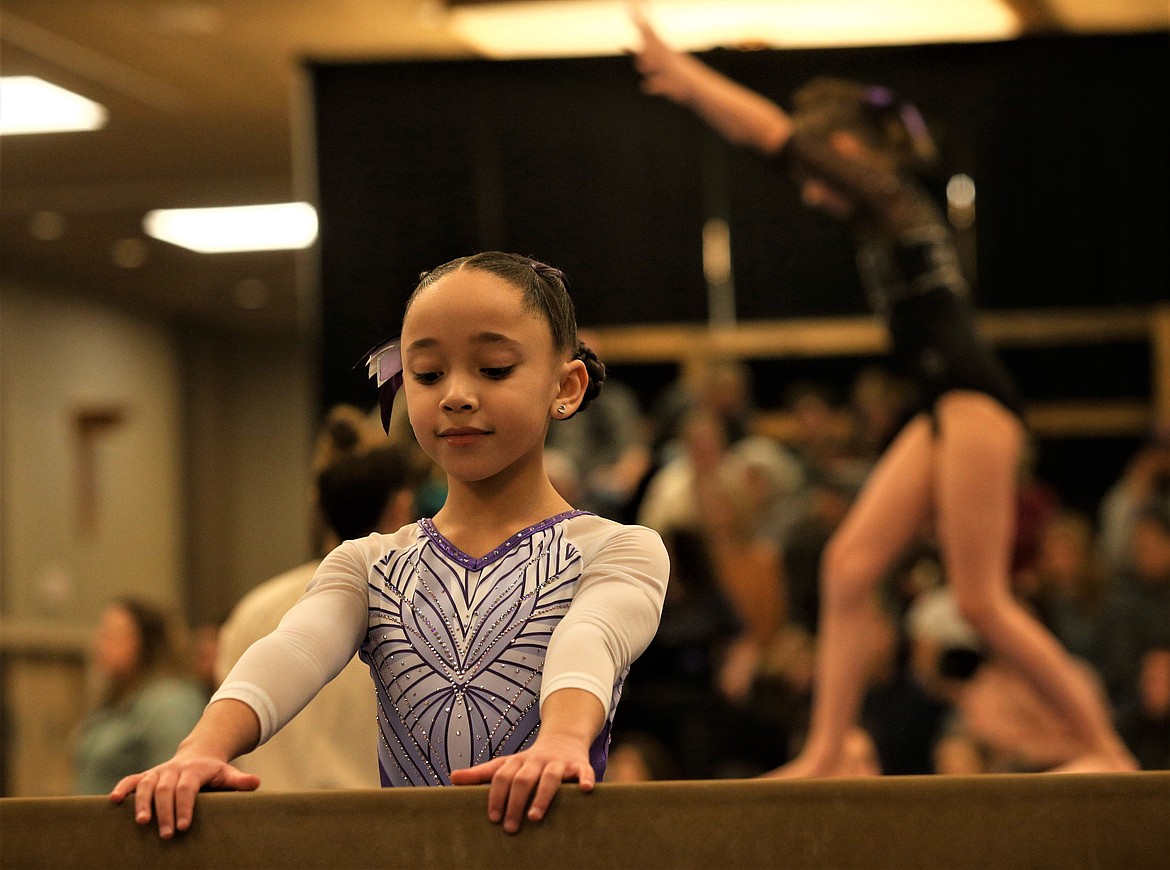 Saige Cruize of Avant Coeur Gymnastics focuses before taking the balance beam at the Great West Gym Fest at The Coeur d'Alene Resort on Thursday.