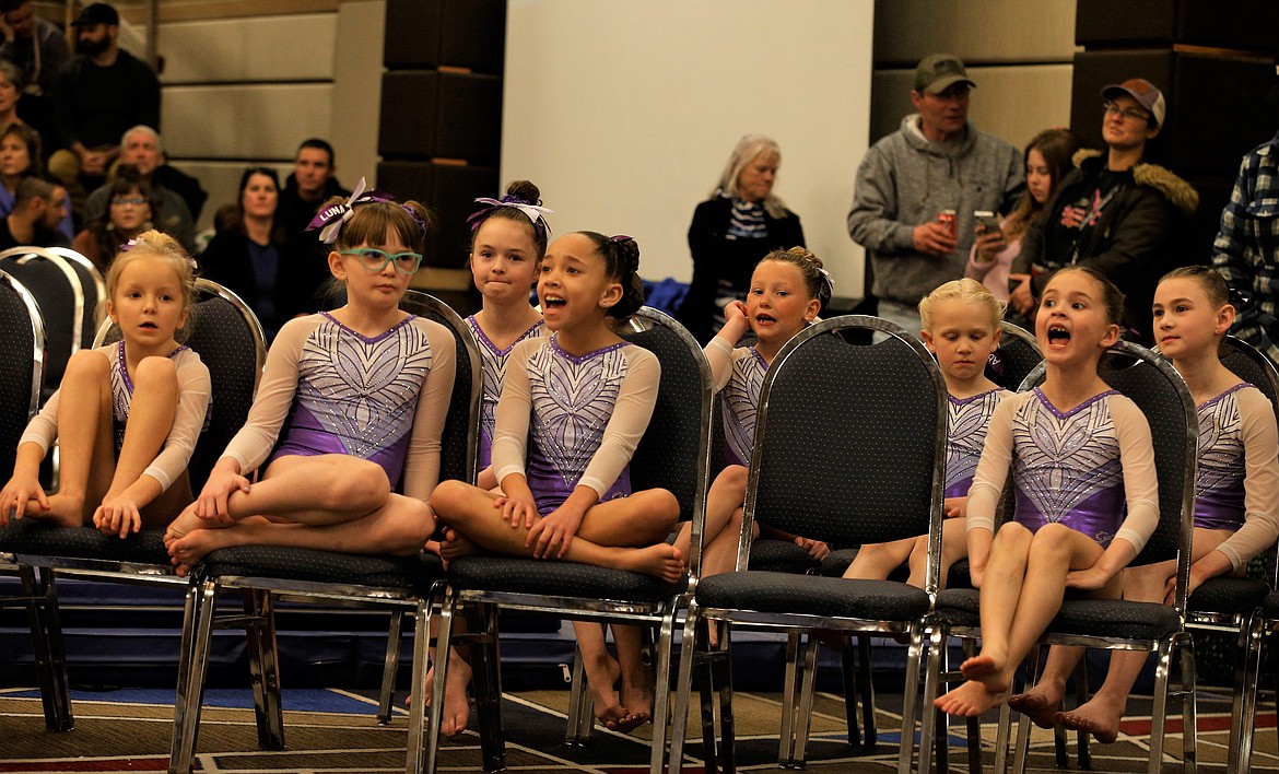 Members of Avant Coeur Gymnastics cheer for a teammate during the Great West Gym Fest at The Coeur d'Alene Resort on Thursday.