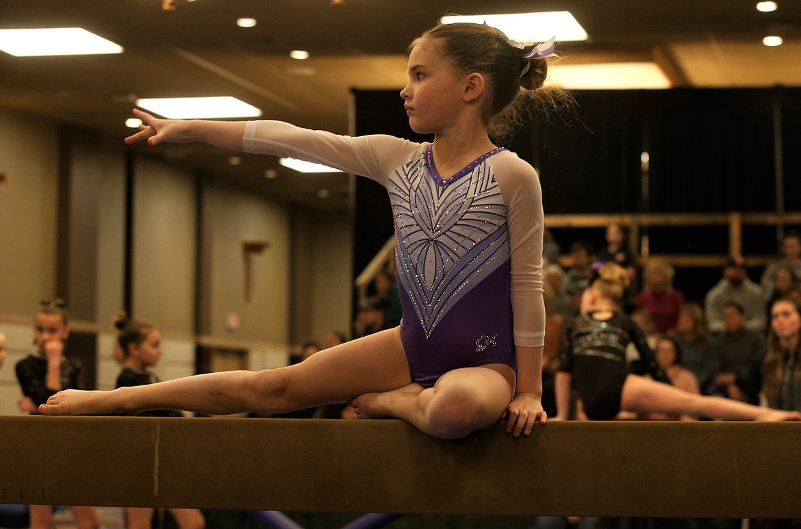 Avonlea Cotten of Avant Coeur Gymnastics performs a balance-beam routine at The Great West Gym Fest at The Coeur d'Alene Resort on Thursday.