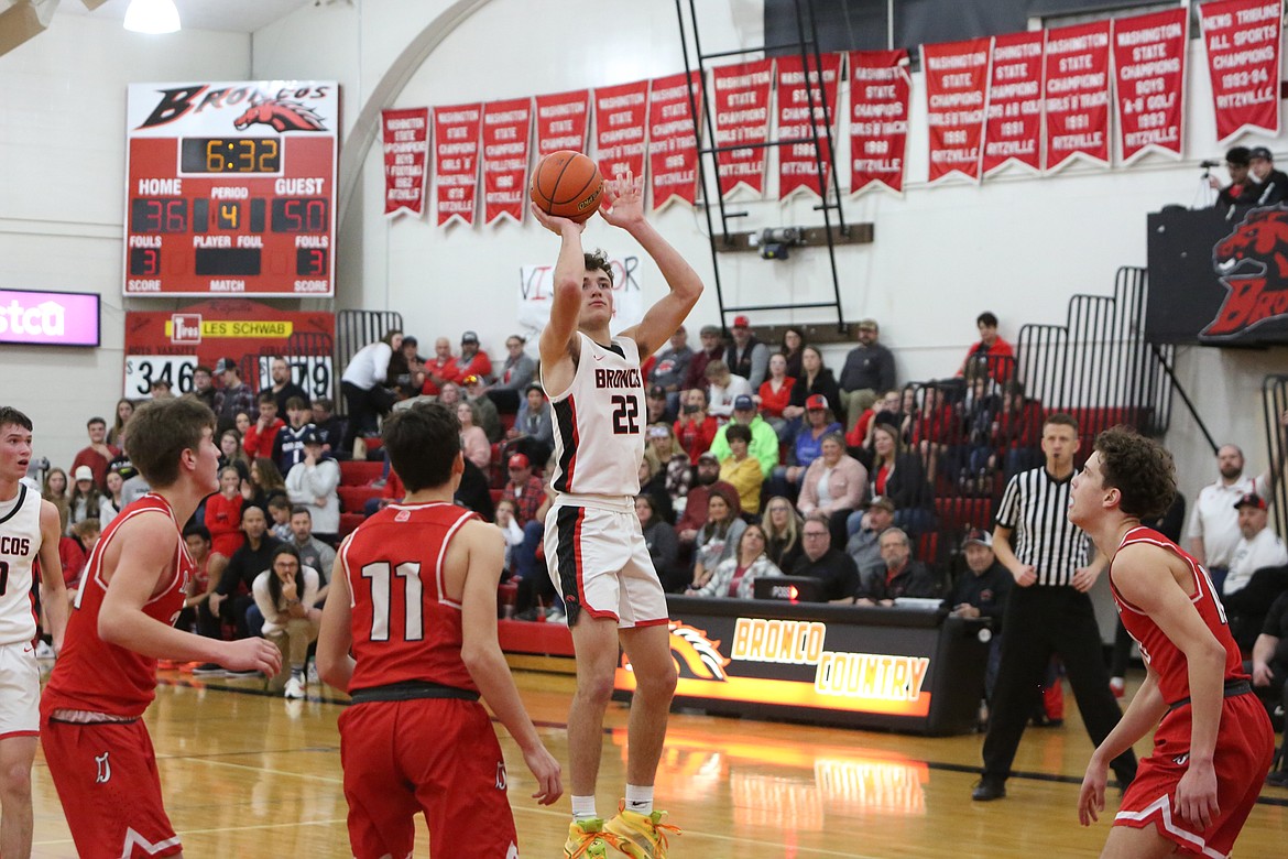 Lind-Ritzville/Sprague senior Chase Galbreath attempts a jump shot against Davenport during a game on Jan. 14. The Broncos earned a No. 9 seed in this year’s 2B State Basketball Tournament.