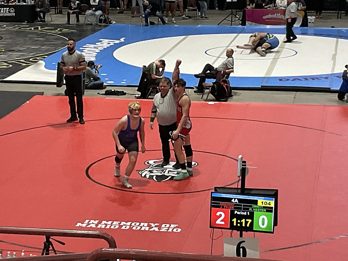 Sandpoint High School's Jorden Tyler is declared the winner of a match on the opening day of the state wrestling tournament on Thursday. He will compete in the semi-final match on Friday.