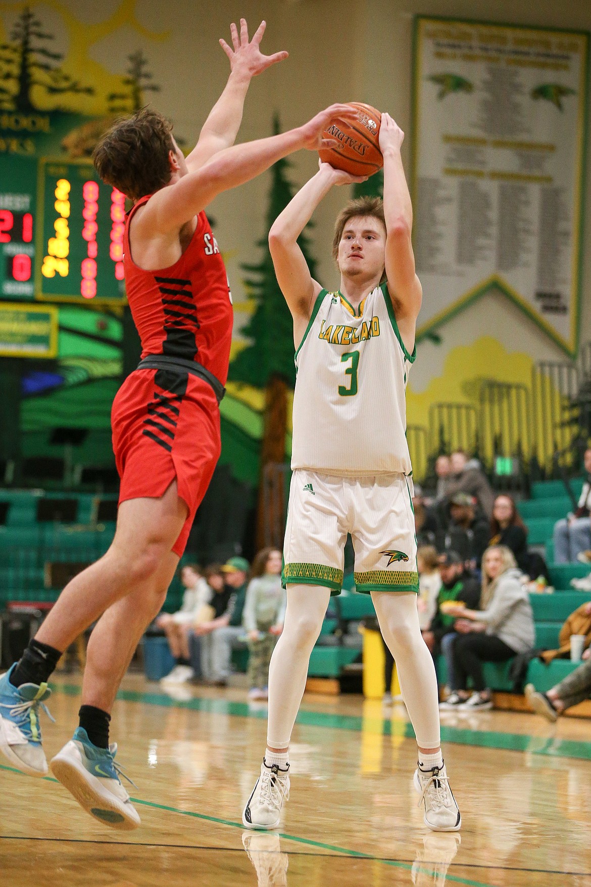 JASON DUCHOW PHOTOGRAPHY
Lakeland senior Collin Cameron hit three 3-pointers and scored a game-high 23 points as the Hawks beat the Sandpoint Bulldogs 60-30 to wrap up the 4A Region 1 championship Friday night in Rathdrum.