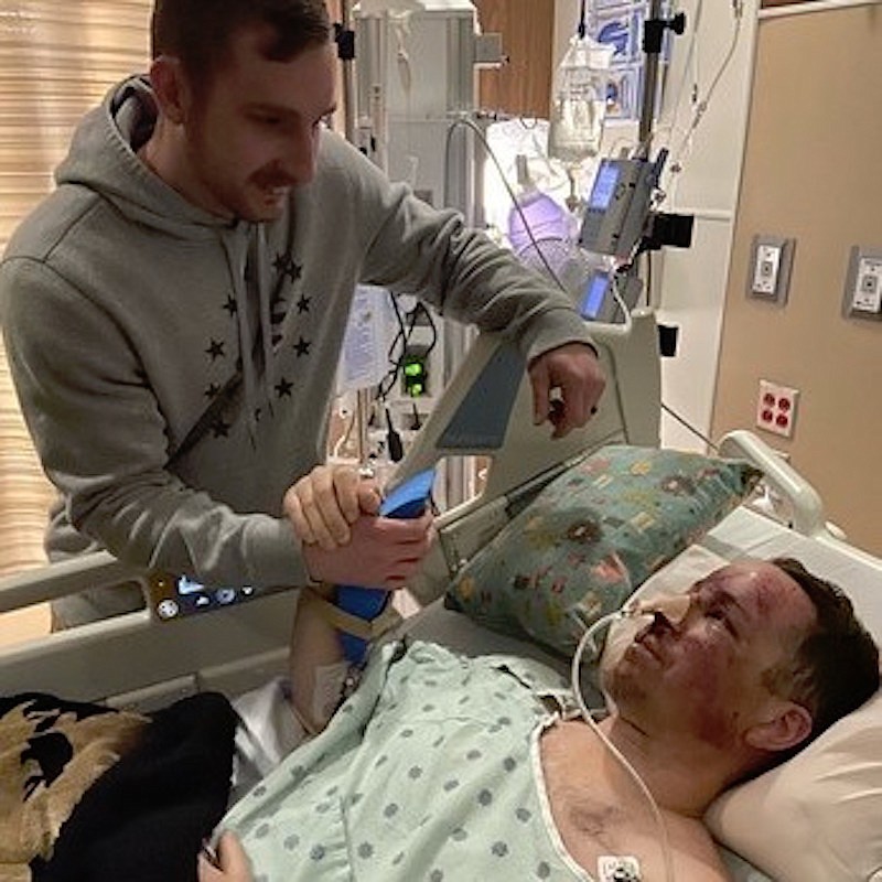 Lincoln County Sheriff's Office Deputy shakes hands with Montana Highway Patrol trooper Lewis Johnson at Logan Health. (Photo courtesy Montana Highway Patrol)