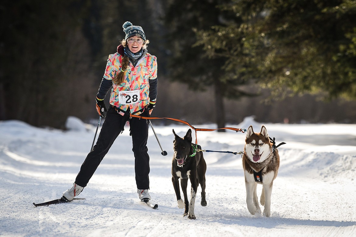 A two-dog skijor team nears the finish line at the Flathead Classic Sled Dog Races at Dog Creek Lodge and Nordic Center in Olney on Saturday, Feb. 25. (Casey Kreider/Daily Inter Lake)