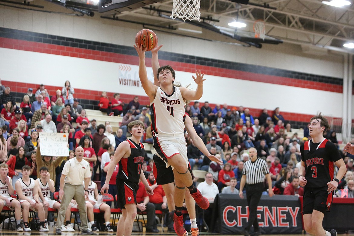 Lind-Ritzville/Sprague senior Hunter Dinkins (11) drives to the rim late in the fourth quarter against Dayton-Waitsburg.