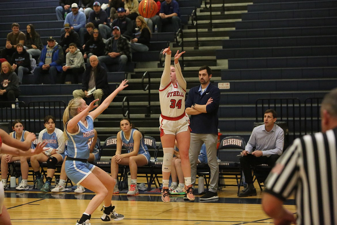 Othello junior Riley Farman (34) attempts a three-pointer during the first half against Mark Morris. Farman hit a three that started a 10-0 Huskie run in the fourth quarter.