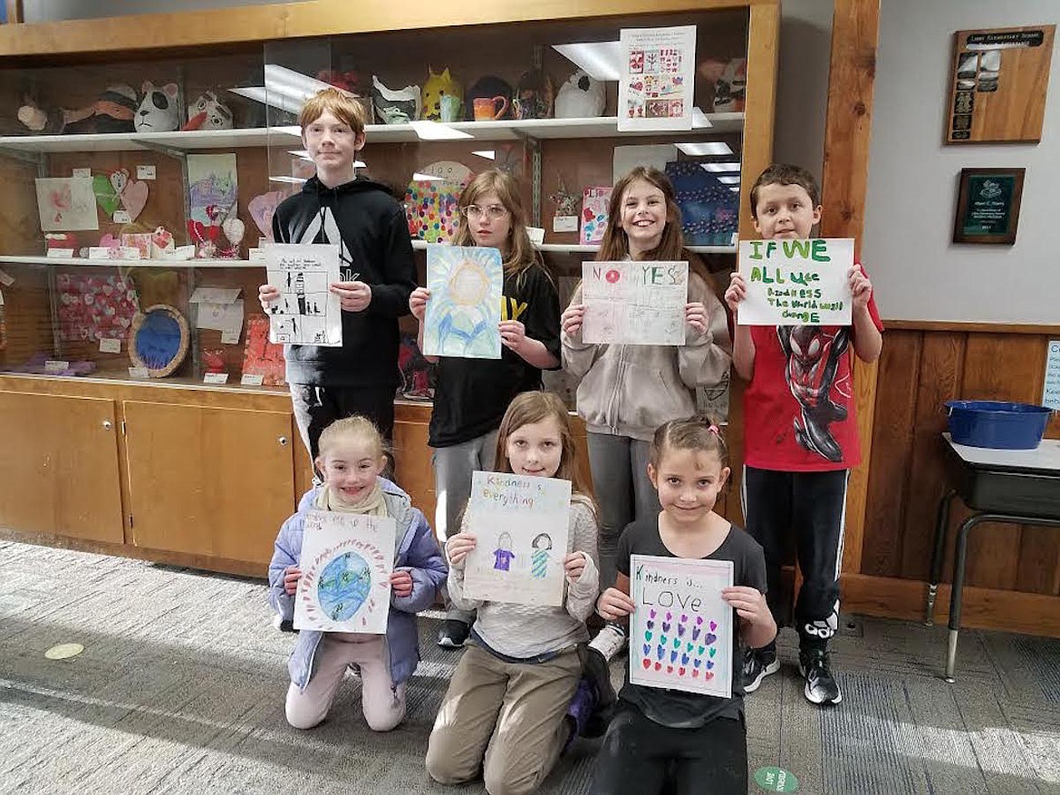 Here are the winners of the poster contest during Random Acts of Kindness week at Libby Elementary School. From left, front row, are Blakely Haugen, Emmy Hayven and Aurora Nason. From left, back row, are Gabriel Watts, Ivy Luchi, Kinley Iliff and Andrew Duran. (Photo courtesy Libby Elementary School)
