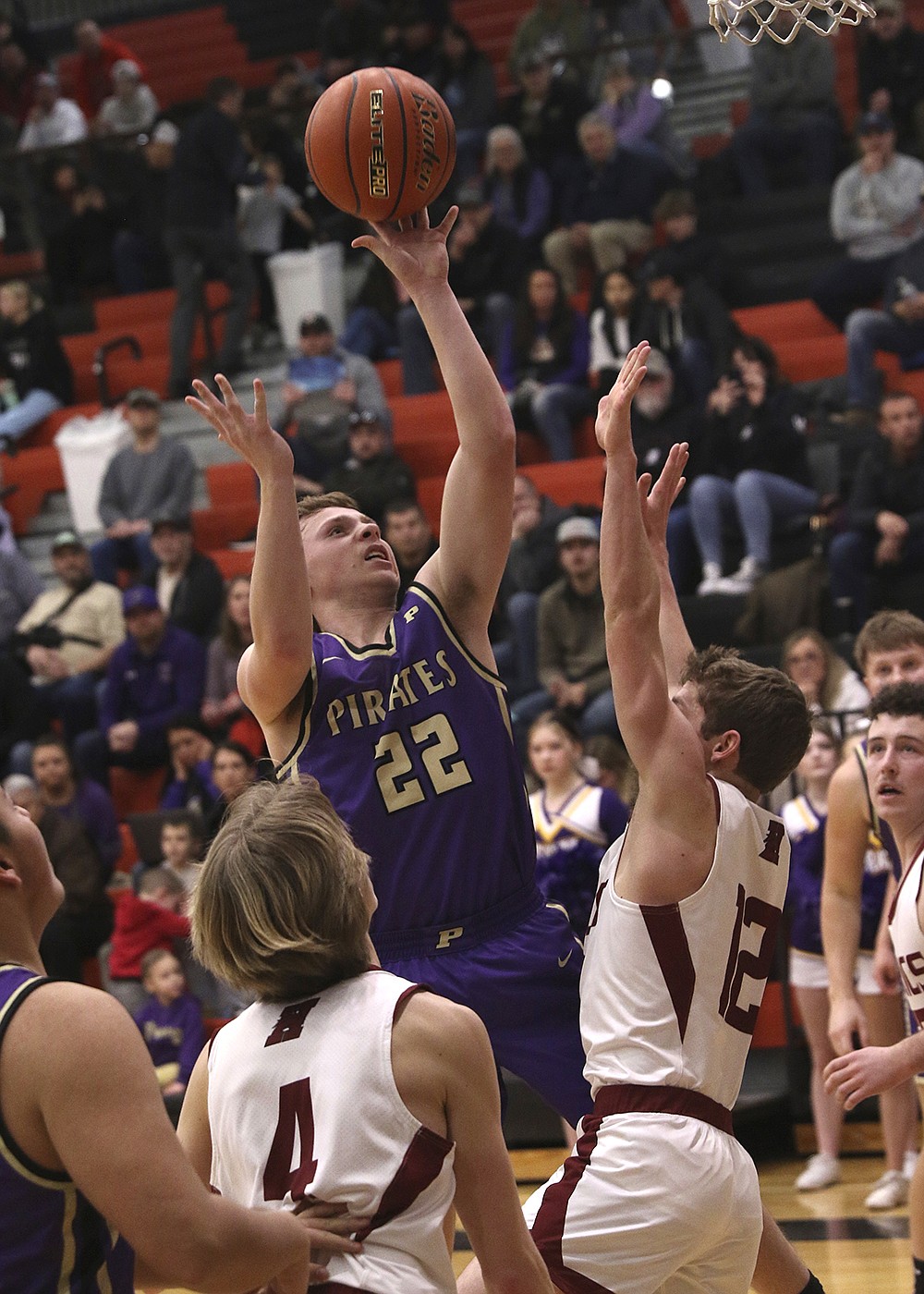 Trent Wilson stretches for the basket against Hamilton during last week's Class A Divisionals in Ronan. (Bob Gunderson photo)