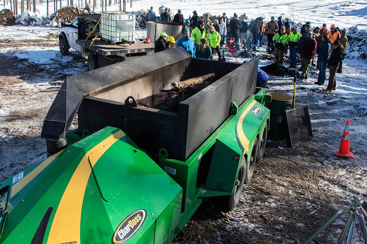 The CharBoss, a machine that converts woody material into biochar, is seen on Feb. 16, 2023 at a showcase event near Coram. (Kate Heston/Daily Inter Lake)