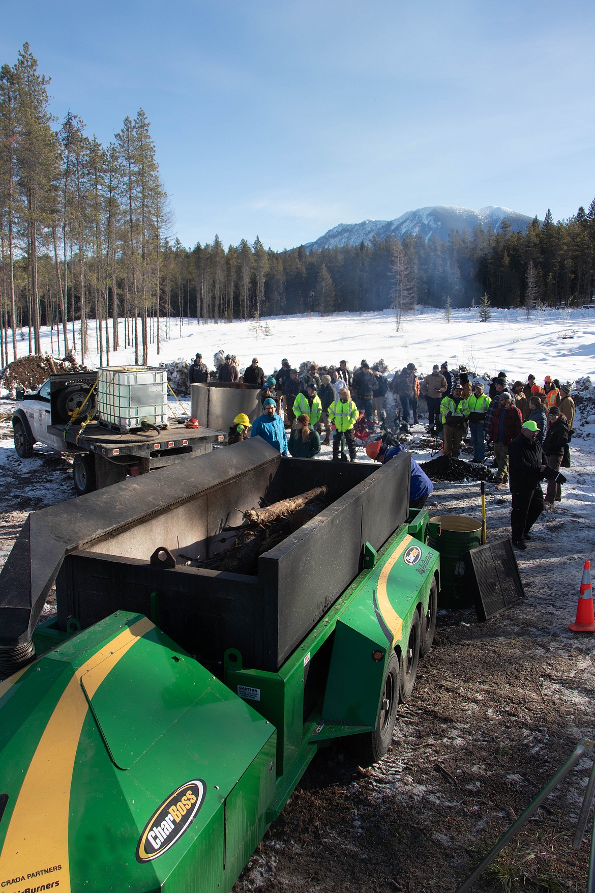 The CharBoss, a machine that converts woody material into biochar, is seen on Feb. 16, 2023 at a showcase event near Coram. (Kate Heston/Daily Inter Lake)