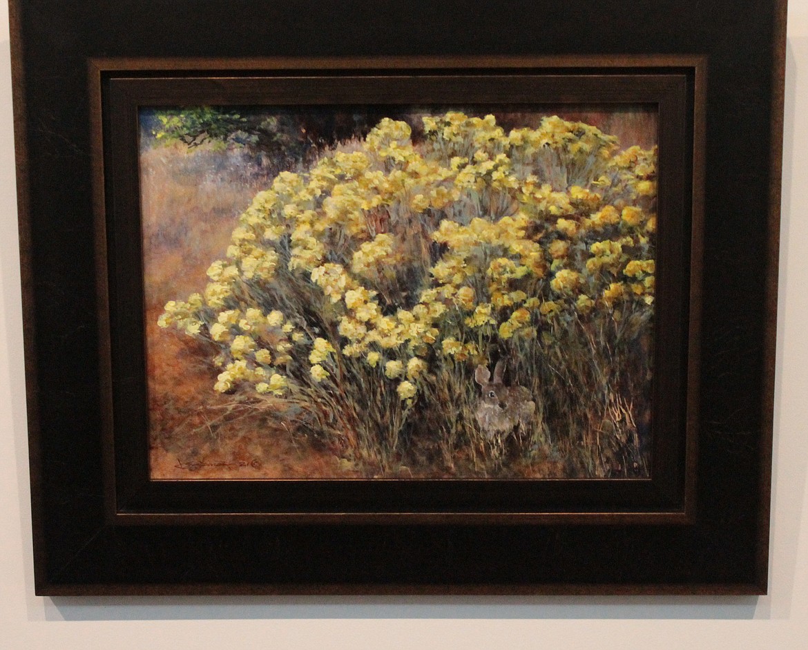 “Rabbitbrush Refuge,” by Joan Eckman, shows a plant that’s often dismissed as a weed but which represents Central Washington, according to Moses Lake Museum & Art Center Director Dollie Boyd. The painting is one of many on display at the museum through March 17.
