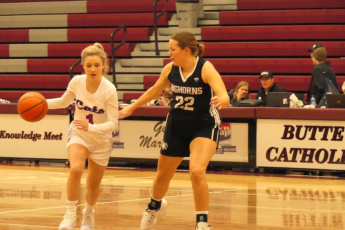 Superior senior Darby Haskins dribbles past Lone Peak's Vera Grabow (22) during their game Saturday during the Western Division C tournament in Butte. (Chuck Bandel/VP-MI)