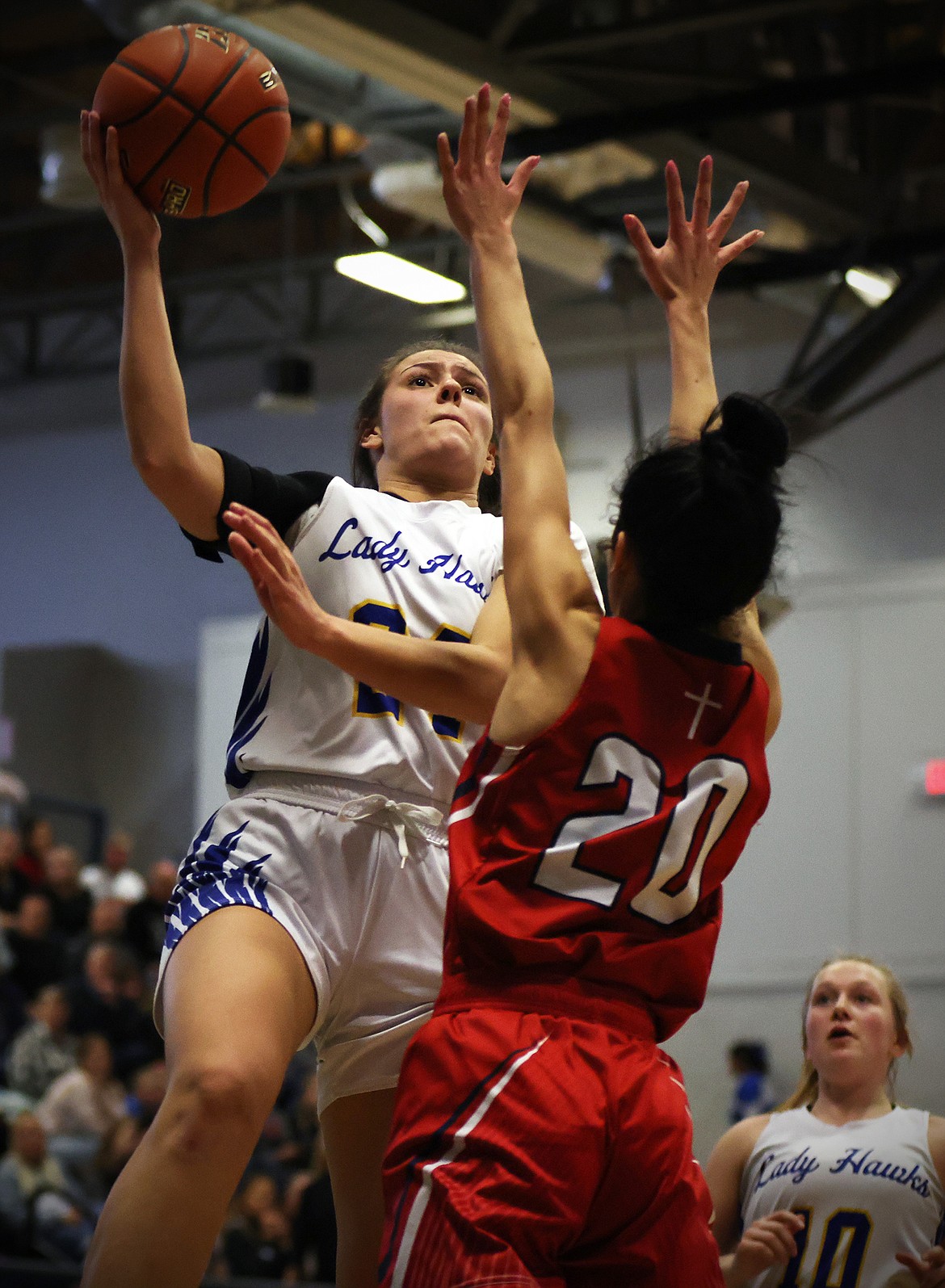 Avery Burgess drives in for a shot for the Lady Hawks during Thompson Falls' matchup against Loyola at the Western B Divisional Tournament in Anaconda over the weekend. (Jeremy Weber/Bigfork Eagle)