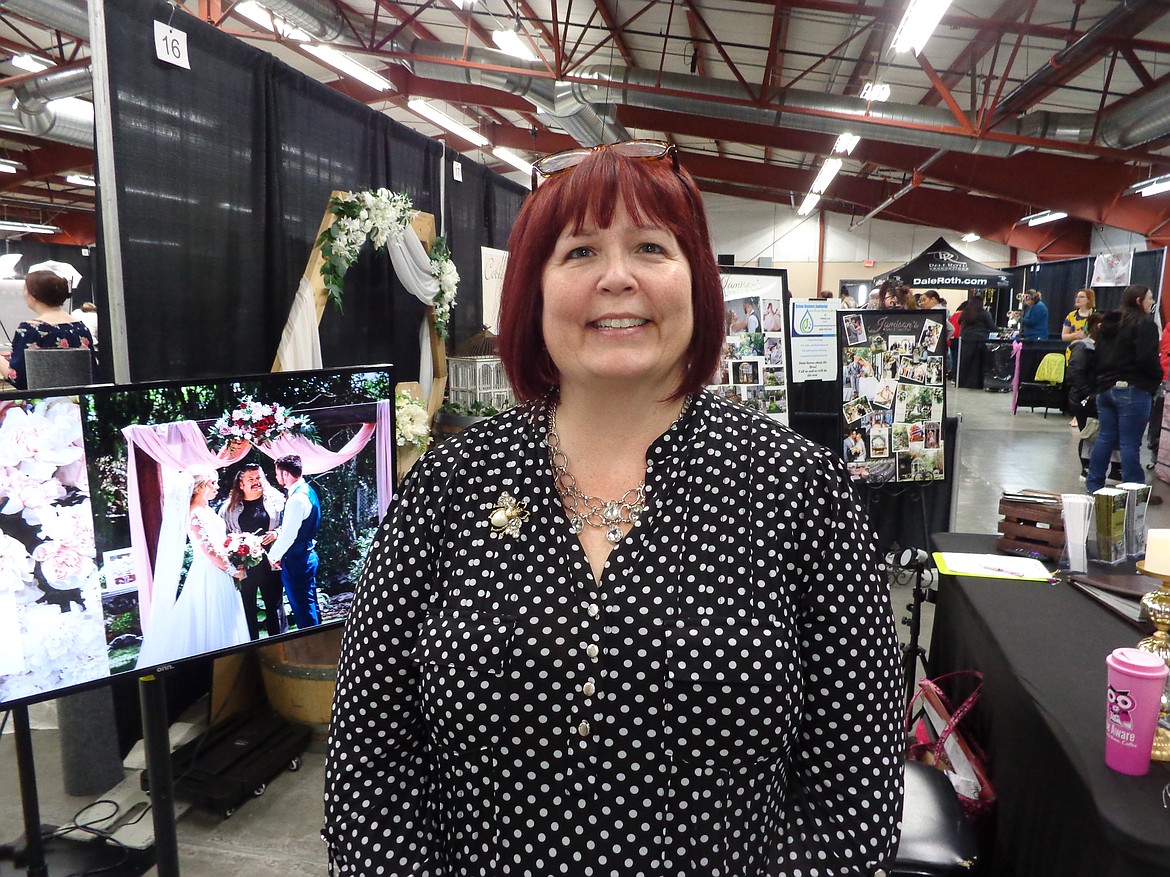 Sandy Hanson, event planning consultant and owner of Enchanting Gowns and Jamison’s Event Center in Moses Lake, at the 2023 Bridal Expo on Saturday. Hanson said the show is a good way to showcase local businesses.