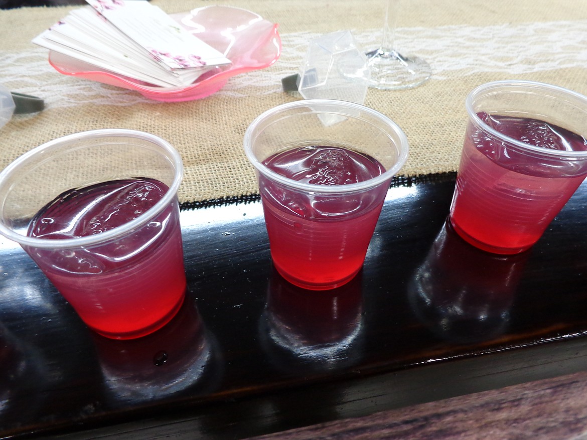 Shot glasses of diluted huckleberry syrup – just one of the beverage options for couples to choose from at the expo.