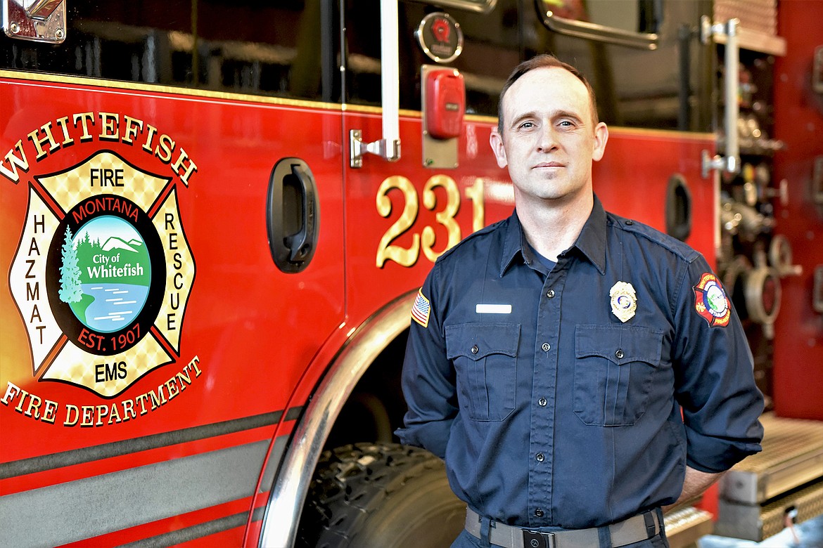 Jamison Smith of the Whitefish Fire Department is raising money for cancer research by participating in the Leukemia and Lymphoma Society's Firefighter Stairclimb. (Julie Engler/Whitefish Pilot)