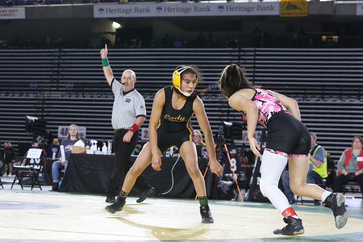 Moses Lake junior Ashley Naranjo, left, won her second-straight state title at the 2023 Mat Classic in Tacoma on Feb. 18.