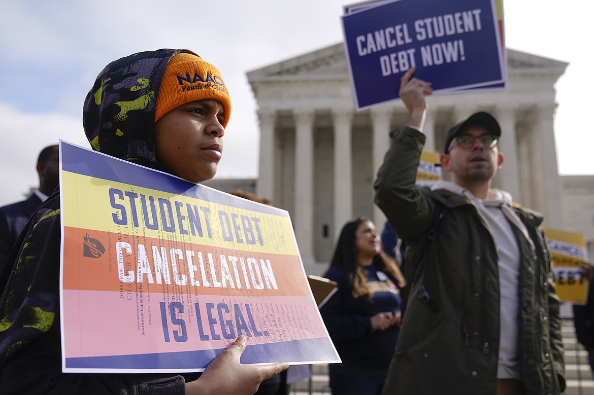 Student debt relief advocates gather outside the Supreme Court on Capitol Hill in Washington, Tuesday, Feb. 28, 2023, ahead of arguments over President Joe Biden's student debt relief plan. (AP Photo/Patrick Semansky)