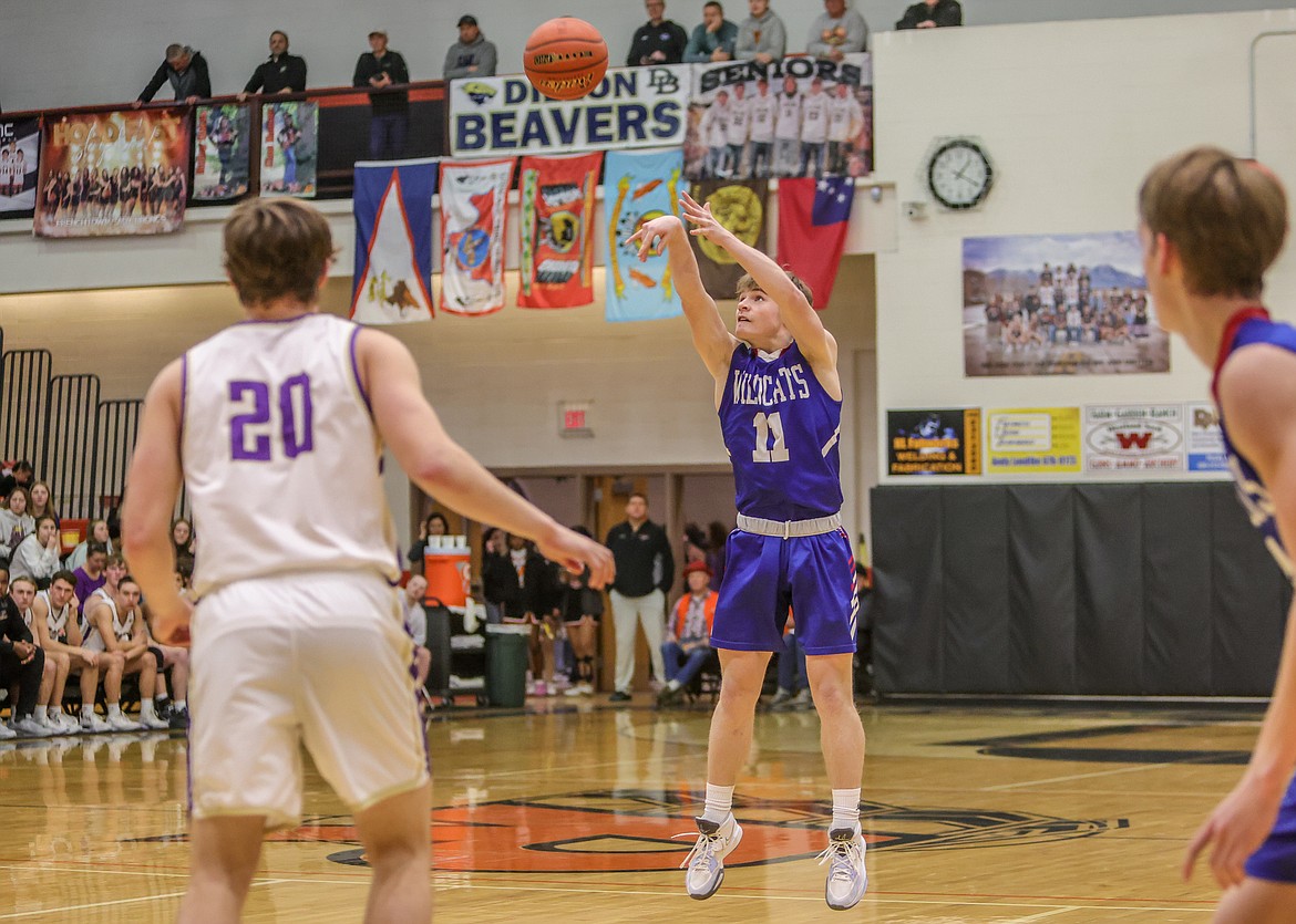 Junior Mark Robison takes a shot against Polson in the Western A Divisional Tournament on Friday in Ronan. (JP Edge photo)