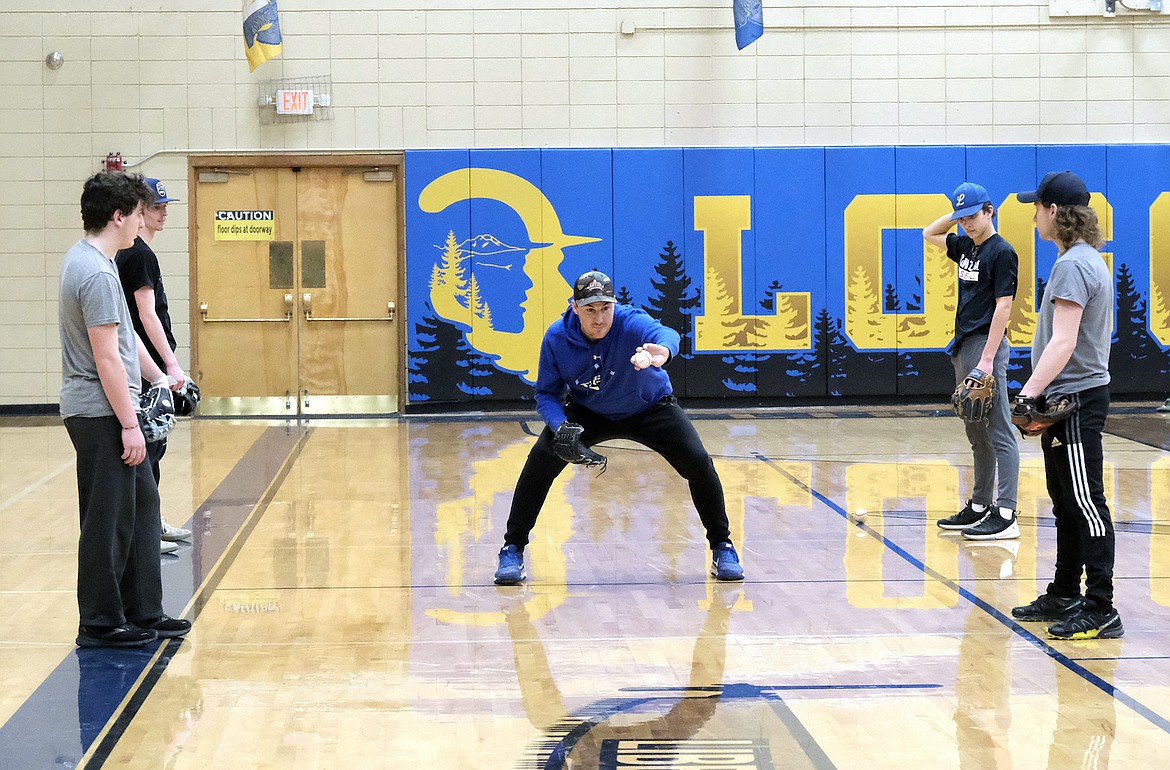 Libby Loggers American Legion baseball coach Kelly Morford gives instruction in the first practice on Feb. 23 at the Libby High School gym. (Paul Sievers/The Western News)