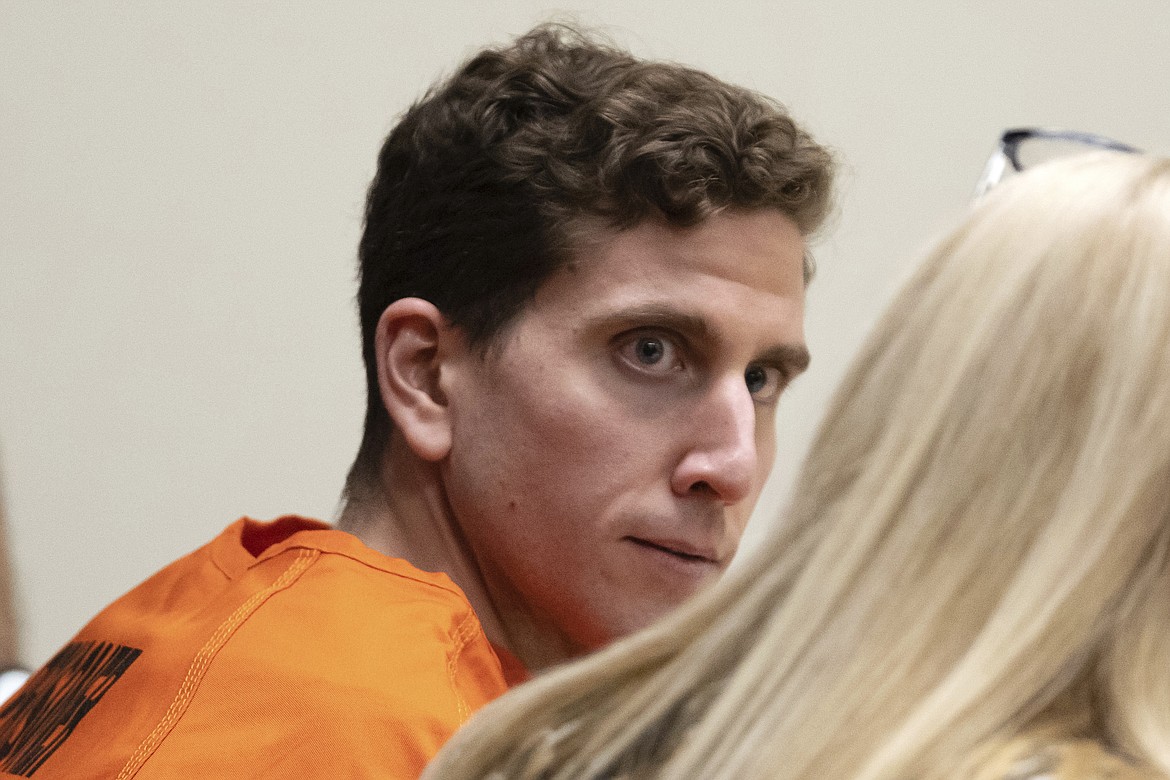 Bryan Kohberger, left, who is accused of killing four University of Idaho students in November 2022, looks toward his attorney, public defender Anne Taylor, right, during a hearing in early January. Law enforcement officials seized dark clothing, medical gloves, a flashlight and other items from a Pennsylvania home where they arrested Kohberger, a graduate student charged with stabbing four University of Idaho students to death, according to newly unsealed court documents. The records were made public on Tuesday.