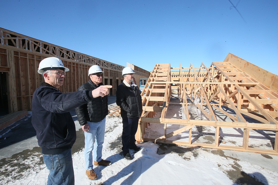 From left, Kootenai Classical Academy founding board member Michael Burgess, Headmaster Ed Kaitz and Director of Operations Conrad Woodall on Friday discuss what the future holds for the charter school, which is set to open for the 2023-2024 school year.