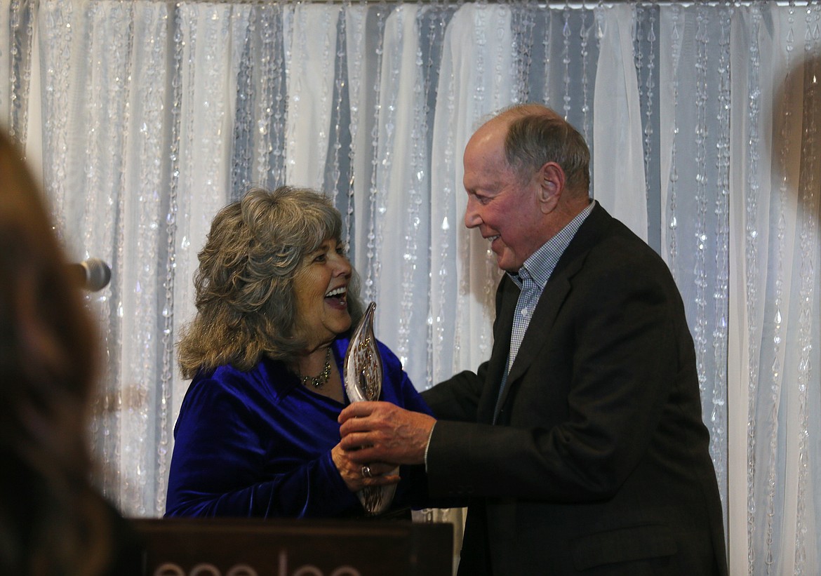 Post Falls City Council President Kerri Thoreson and Doyle Jacklin share a smile Tuesday evening as she presents him with the 2023 Heritage Award honoring the Jacklin family during the Post Falls Chamber of Commerce's Community Recognition Gala.