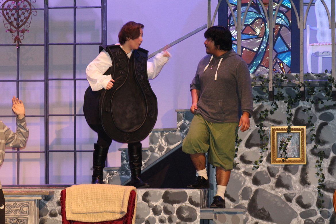 Maurice (Abraham Santiago), right, encounters a magical clock (Jazzlynn Padron), left, who doesn’t want him in the castle.